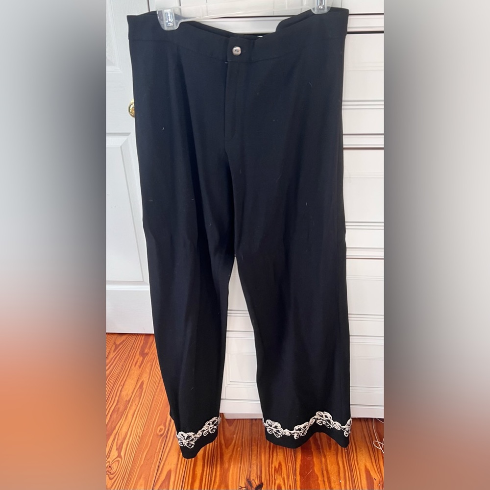 Jill McGowan wool trousers with embellished floral hemline.